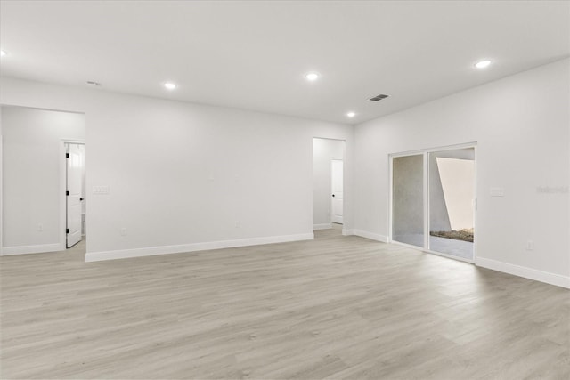 17445 SW 41st Cir, Ocala, FL 34473 - spare room with light wood-type flooring and recessed lighting