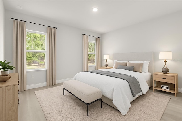 17445 SW 41st Cir, Ocala, FL 34473 - bedroom with light wood-type flooring and recessed lighting