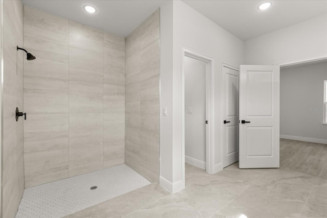 17445 SW 41st Cir, Ocala, FL 34473 - full bath with a tile shower, recessed lighting, and marble look tiles