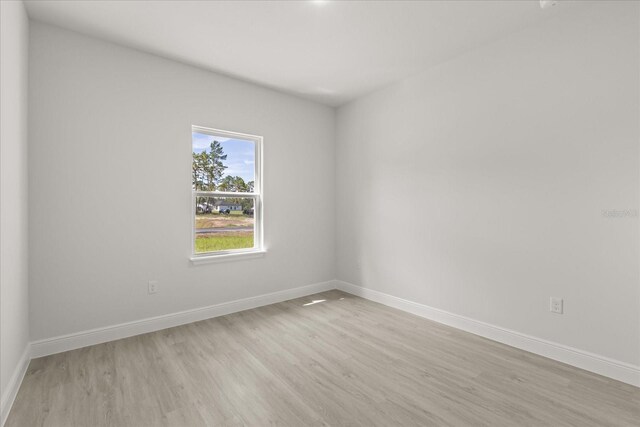 17445 SW 41st Cir, Ocala, FL 34473 - unfurnished room featuring light wood finished floors