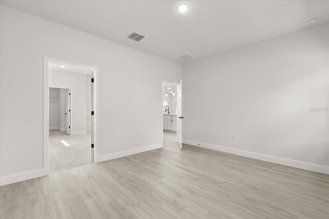 17445 SW 41st Cir, Ocala, FL 34473 - unfurnished bedroom with recessed lighting and light wood finished floors