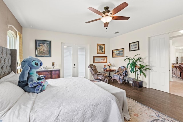 13023 Sweet Hill Rd, Polk City, FL 33868 - bedroom featuring wood finished floors and ceiling fan