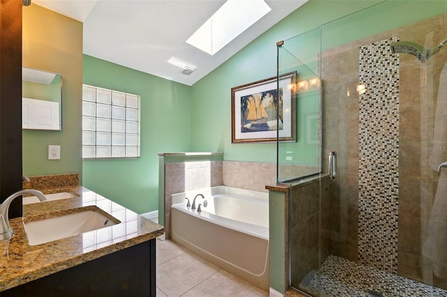 171 Cedarpark Ln, Davenport, FL 33837 - bathroom featuring a skylight, a bath, lofted ceiling, vanity, and a stall shower