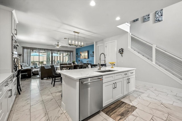 7454 Gathering Dr, Reunion, FL 34747 - kitchen featuring dishwasher, light marble finish flooring, open floor plan, a ceiling fan, and recessed lighting