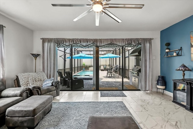 7454 Gathering Dr, Reunion, FL 34747 - living room with ceiling fan and marble look tiles