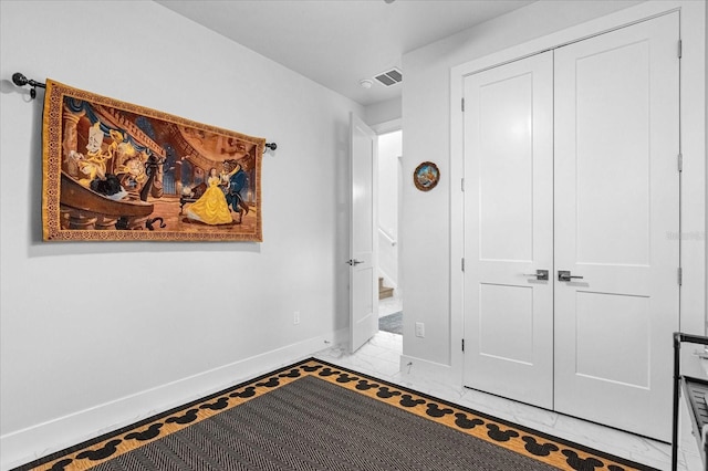 7454 Gathering Dr, Reunion, FL 34747 - hall with baseboards and light marble finish flooring