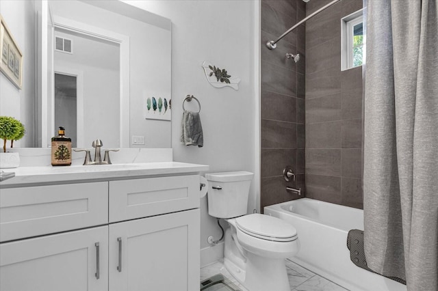 7454 Gathering Dr, Reunion, FL 34747 - full bathroom with vanity, marble finish flooring, and shower / tub combo