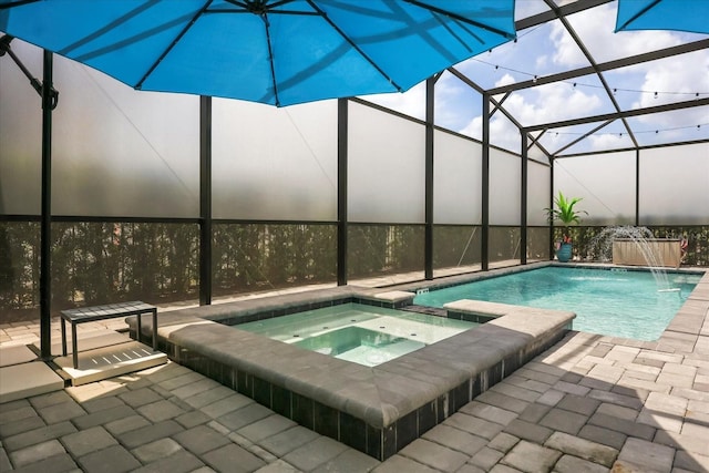 7454 Gathering Dr, Reunion, FL 34747 - view of pool featuring a pool with connected hot tub, a lanai, and a patio