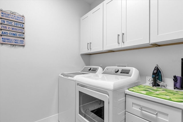 7454 Gathering Dr, Reunion, FL 34747 - laundry room with separate washer and dryer and cabinet space