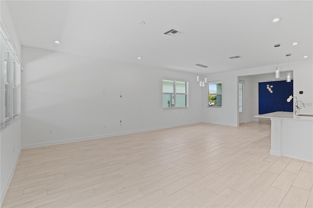 11687 SW Viridian Blvd, Port St Lucie, FL 34987 - unfurnished room featuring recessed lighting and light wood-type flooring
