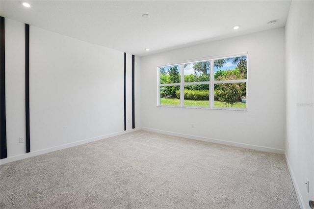 11687 SW Viridian Blvd, Port St Lucie, FL 34987 - unfurnished room featuring carpet floors, recessed lighting, and a smoke detector