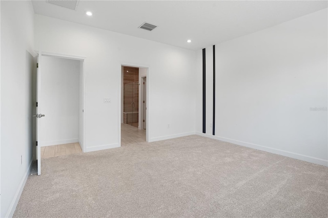 11687 SW Viridian Blvd, Port St Lucie, FL 34987 - unfurnished bedroom with light carpet and recessed lighting