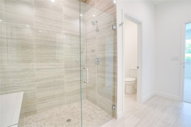 11687 SW Viridian Blvd, Port St Lucie, FL 34987 - bathroom featuring a stall shower and toilet
