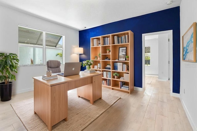 11687 SW Viridian Blvd, Port St Lucie, FL 34987 - home office featuring light wood-style floors