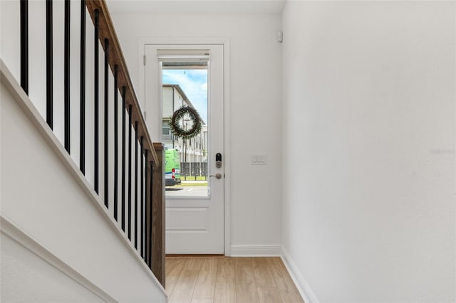 8484 Sperry St, Orlando, FL 32827 - entryway featuring light wood-style flooring and baseboards