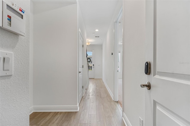 8484 Sperry St, Orlando, FL 32827 - hallway featuring light wood-style floors and recessed lighting