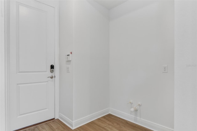8484 Sperry St, Orlando, FL 32827 - laundry room featuring light wood-type flooring