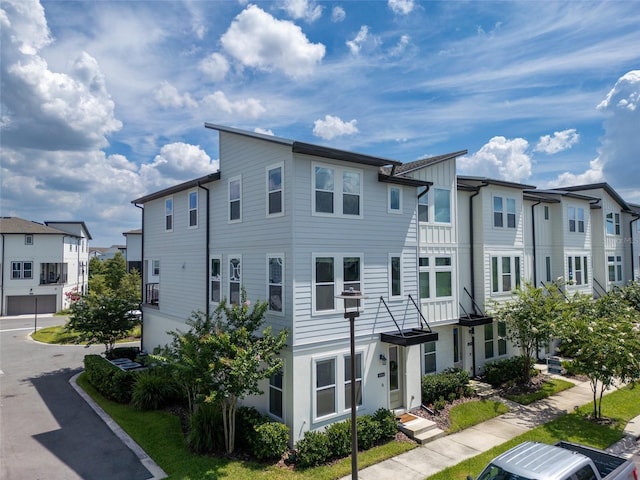 8484 Sperry St, Orlando, FL 32827 - view of building exterior featuring a residential view