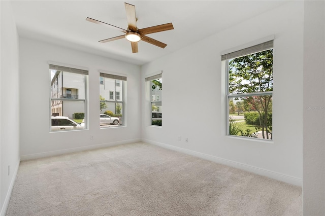 8484 Sperry St, Orlando, FL 32827 - carpeted empty room with healthy amount of natural light and a ceiling fan
