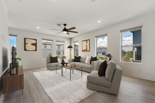8484 Sperry St, Orlando, FL 32827 - living room with ceiling fan, light wood-style flooring, and recessed lighting