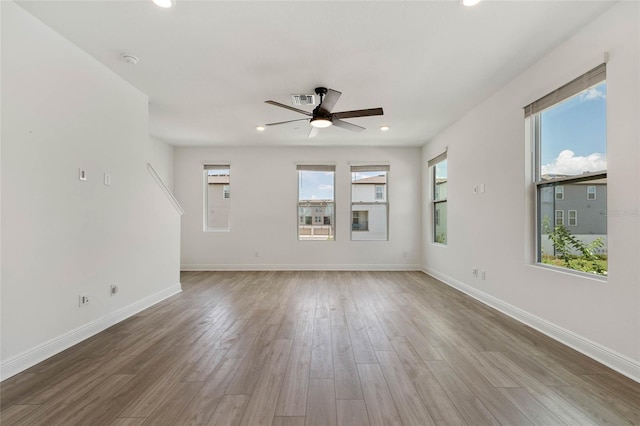 8484 Sperry St, Orlando, FL 32827 - spare room with a ceiling fan, wood finished floors, recessed lighting, and a smoke detector