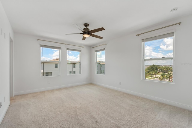 8484 Sperry St, Orlando, FL 32827 - empty room with a ceiling fan, light carpet, and a smoke detector