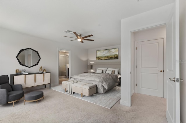 8484 Sperry St, Orlando, FL 32827 - carpeted bedroom with ceiling fan and connected bathroom