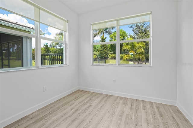 11695 SW Viridian Blvd, Port St Lucie, FL 34987 - unfurnished room featuring light wood-style floors and plenty of natural light