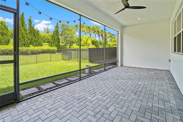 11695 SW Viridian Blvd, Port St Lucie, FL 34987 - unfurnished sunroom featuring ceiling fan