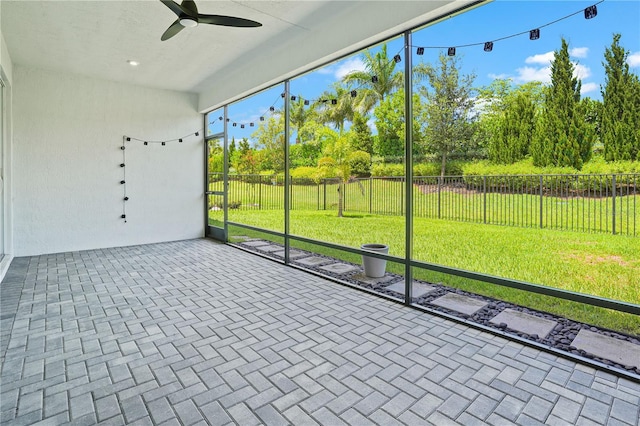 11695 SW Viridian Blvd, Port St Lucie, FL 34987 - unfurnished sunroom with view of wooded area