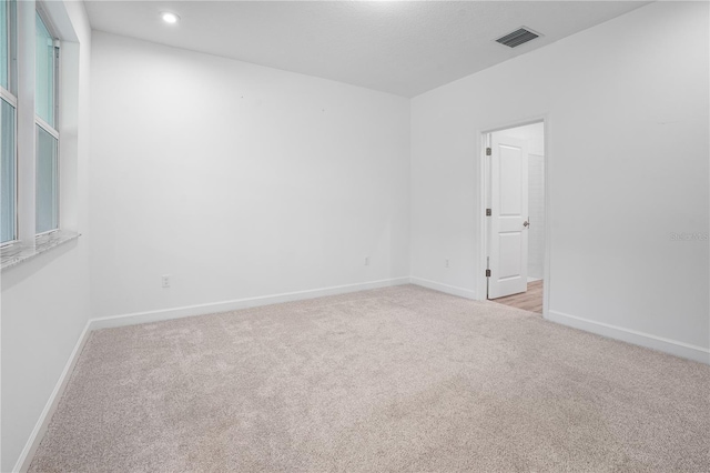 11695 SW Viridian Blvd, Port St Lucie, FL 34987 - unfurnished room featuring carpet flooring and recessed lighting