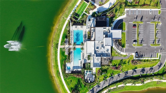 11695 SW Viridian Blvd, Port St Lucie, FL 34987 - drone / aerial view of a pool area and a nearby body of water