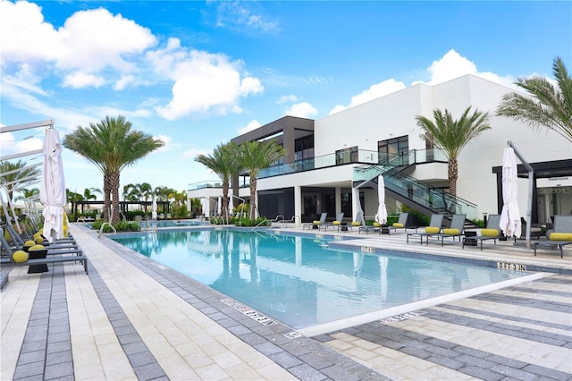 11695 SW Viridian Blvd, Port St Lucie, FL 34987 - community pool with stairs and a patio