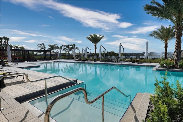 11695 SW Viridian Blvd, Port St Lucie, FL 34987 - community pool with a patio area