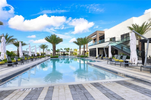 11695 SW Viridian Blvd, Port St Lucie, FL 34987 - community pool with a patio area