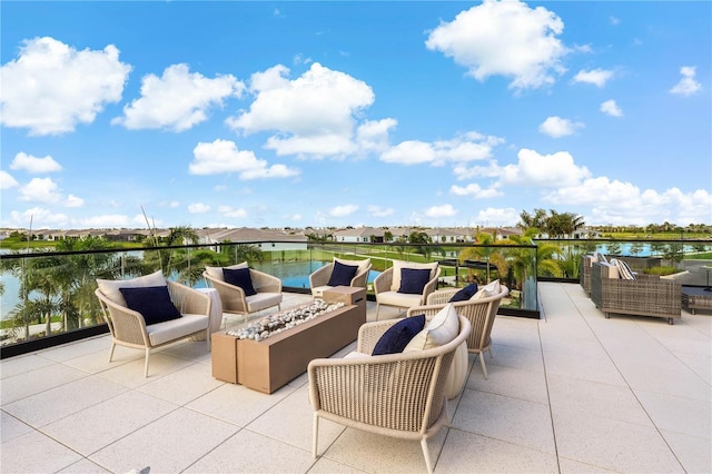 11695 SW Viridian Blvd, Port St Lucie, FL 34987 - view of patio featuring an outdoor living space with a fire pit and a water view