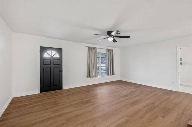 1320 E Lombardy Dr, Deltona, FL 32725 - entryway featuring a ceiling fan and wood finished floors
