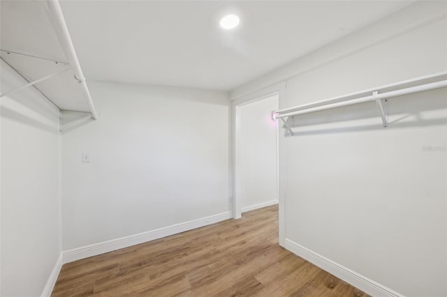 1320 E Lombardy Dr, Deltona, FL 32725 - walk in closet featuring wood finished floors