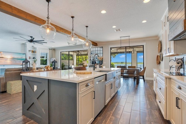 15787 Tangerine Dream Ct, Winter Garden, FL 34787 - kitchen featuring stainless steel dishwasher, premium range hood, light countertops, a textured ceiling, and a center island with sink