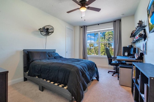 15787 Tangerine Dream Ct, Winter Garden, FL 34787 - bedroom with light carpet, a textured ceiling, an office area, and ceiling fan