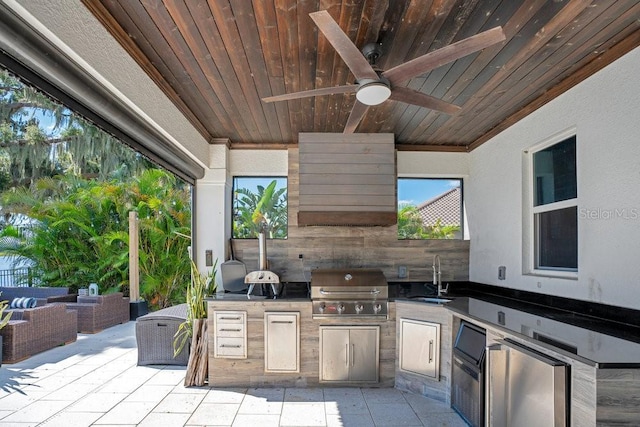 15787 Tangerine Dream Ct, Winter Garden, FL 34787 - view of patio / terrace featuring a ceiling fan, exterior kitchen, and outdoor lounge area