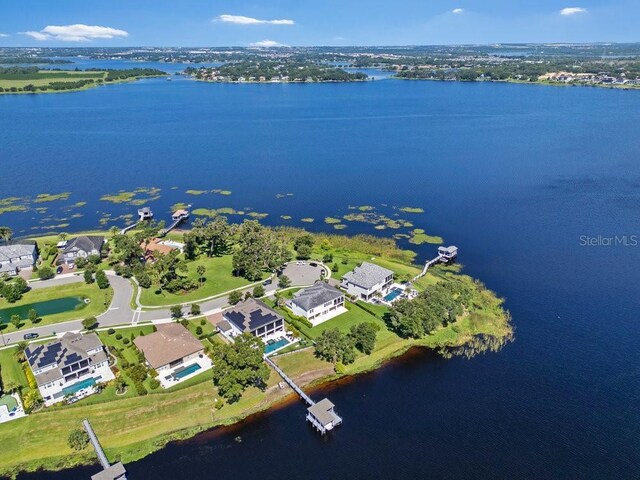 15787 Tangerine Dream Ct, Winter Garden, FL 34787 - aerial view of property and surrounding area with a large body of water and nearby suburban area