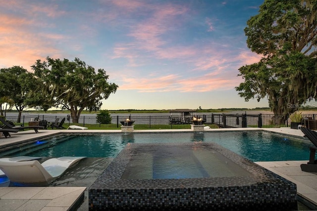 15787 Tangerine Dream Ct, Winter Garden, FL 34787 - view of swimming pool featuring an in-ground hot tub and a patio