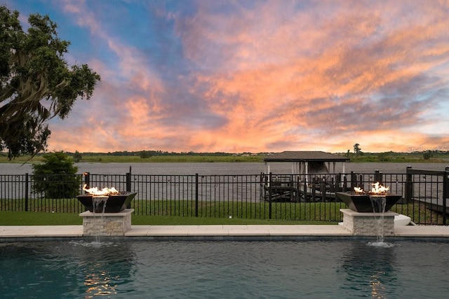 15787 Tangerine Dream Ct, Winter Garden, FL 34787 - view of pool at dusk