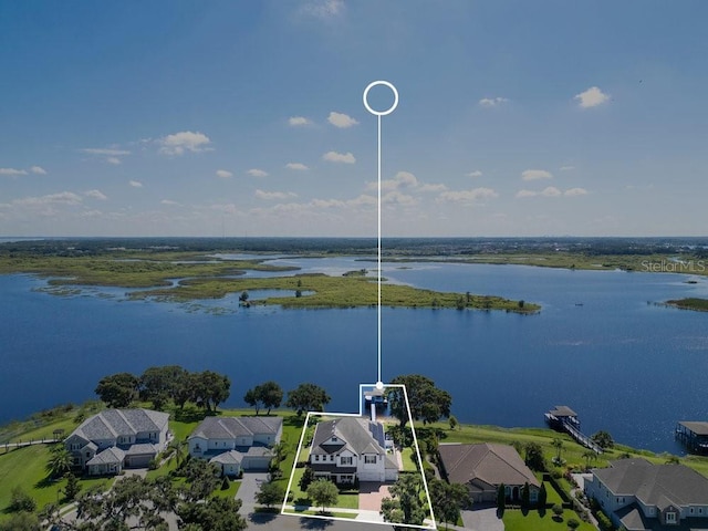 15787 Tangerine Dream Ct, Winter Garden, FL 34787 - aerial perspective of suburban area featuring a large body of water and property parcel outlined