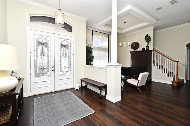 436 Skyview Pl, Chuluota, FL 32766 - entrance foyer with wood finished floors, ornate columns, a chandelier, stairway, and ornamental molding
