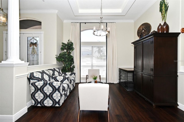 436 Skyview Pl, Chuluota, FL 32766 - interior space featuring a chandelier, dark wood-type flooring, a tray ceiling, ornamental molding, and ornate columns
