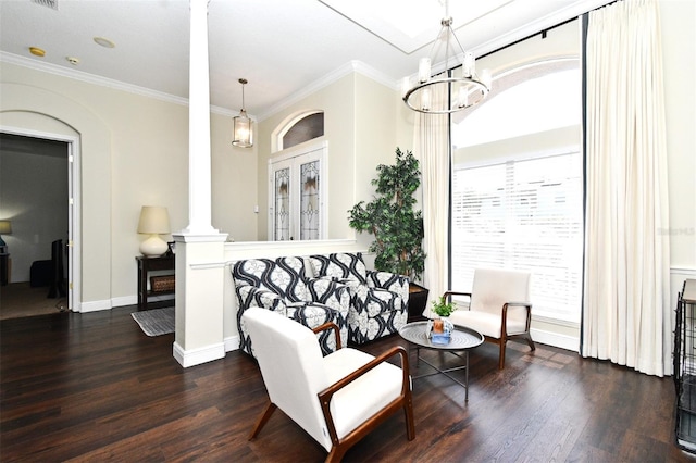 436 Skyview Pl, Chuluota, FL 32766 - living area with decorative columns, dark wood-style flooring, ornamental molding, and a chandelier