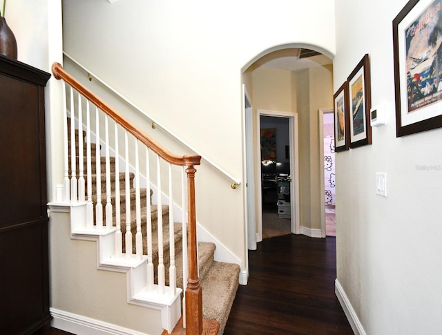 436 Skyview Pl, Chuluota, FL 32766 - staircase with wood finished floors and arched walkways