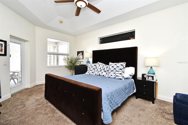 436 Skyview Pl, Chuluota, FL 32766 - bedroom featuring carpet floors, a tray ceiling, and ceiling fan